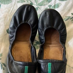Well loved navy blue tieks